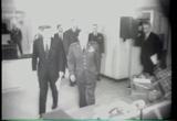 JFK arrives at Omaha underground command post; helicopter to Los 